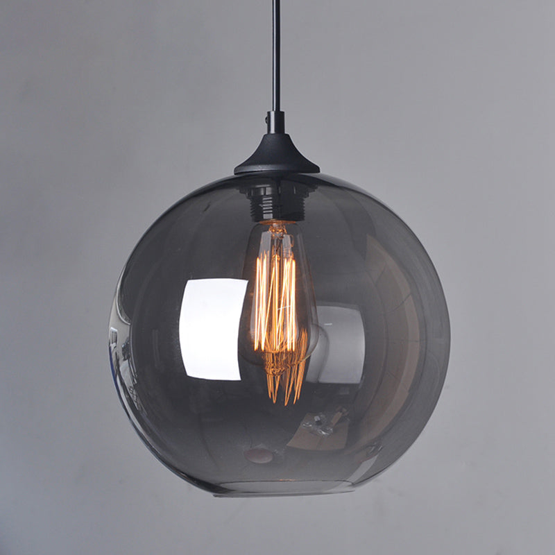 Industrielle Vintage einzelne hängende leichte Schmiedeeisen -Globus -Hängernlampe mit Glasschatten