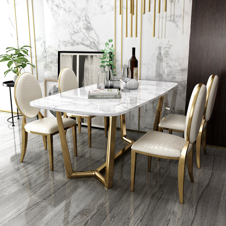 Set di sala da pranzo in marmo moderno con tavolo bianco e base di cavalletto dorato per uso domestico