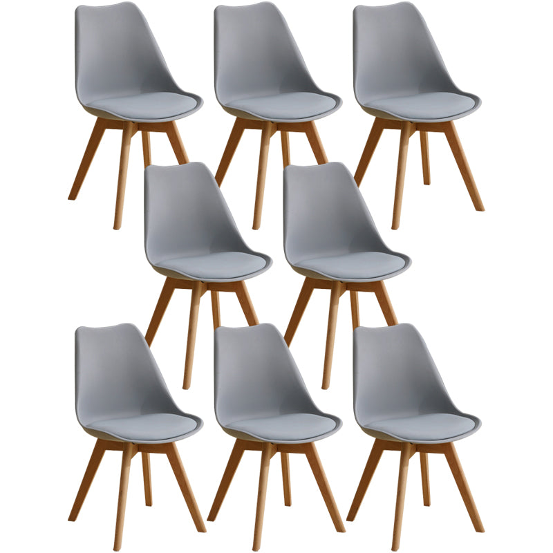 Scandinavian Home Side Chair Indoor Solid Back Plastic Dining Room Chair with Wood Legs