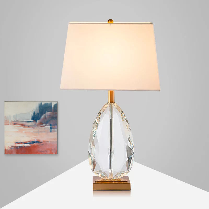 1 Glühbirnenschlafzimmertisch Licht moderner beige Nachttischlampe mit Trapezstoffschatten