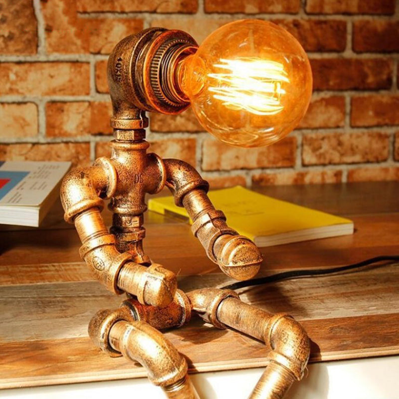 Retro -Stil Eisenrohr Tischlampe Roboterform 1 Leuchttischlampe für Schlafzimmer