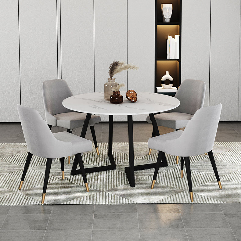 Gesinterde stenen eettafel rond moderne eettafel met zwart frame