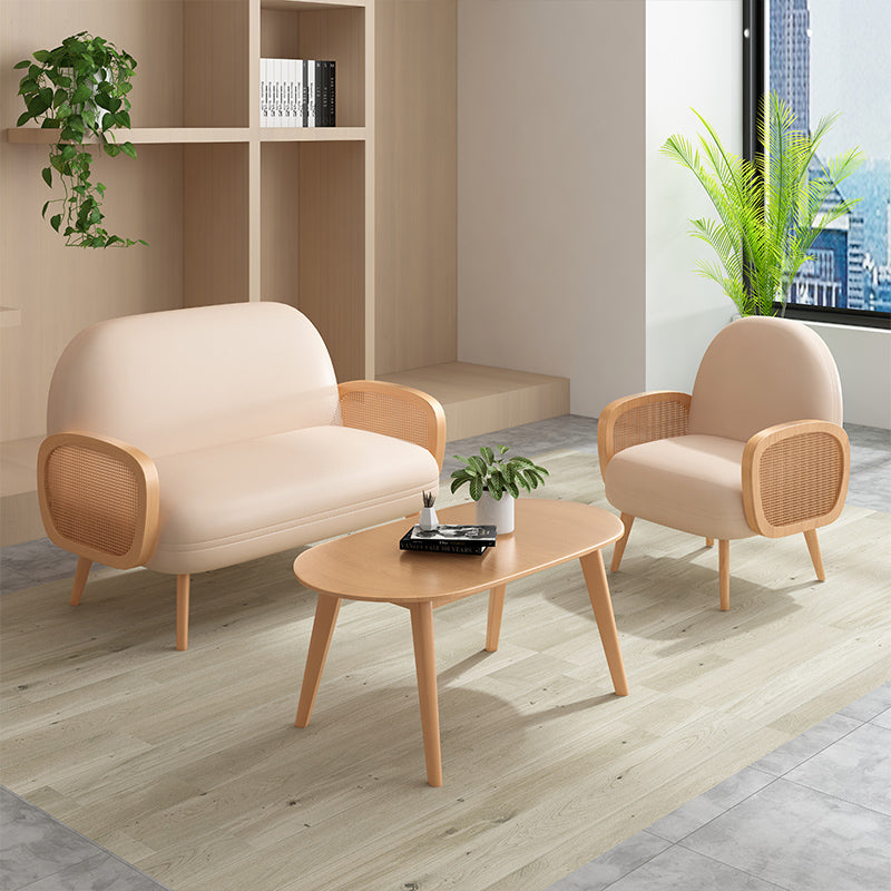 Canapé beige scandinave carré tufté avec 4 pattes en bois pour l'appartement