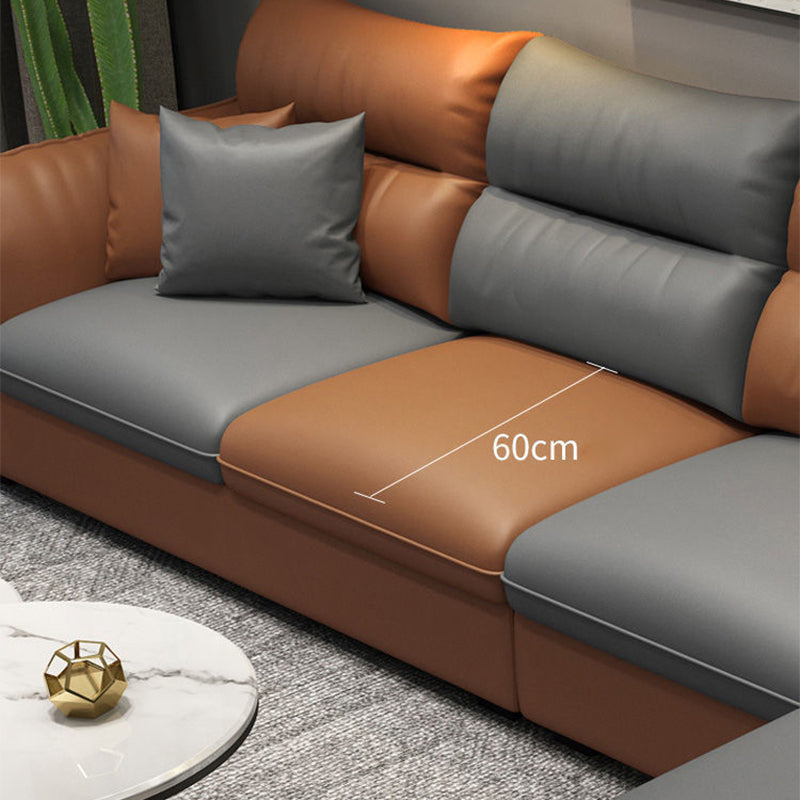 Faux Leather Sectional with Four Pillows Back Flared Arm Sofa