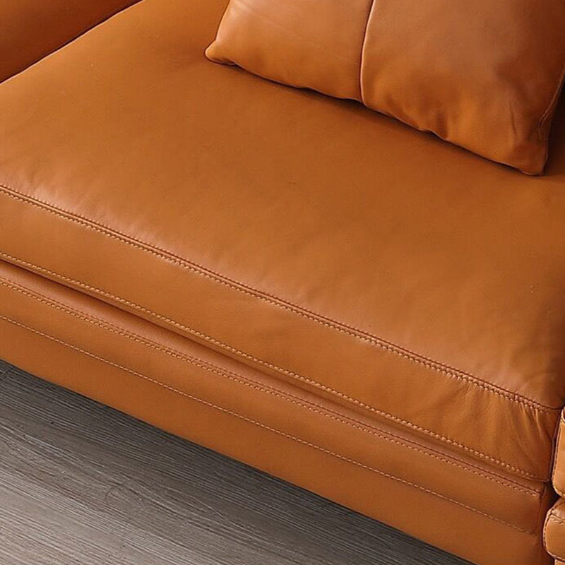 Ornate Leather Upholstery Orange Sofa with Pillow and Square Armrest Back Sectional