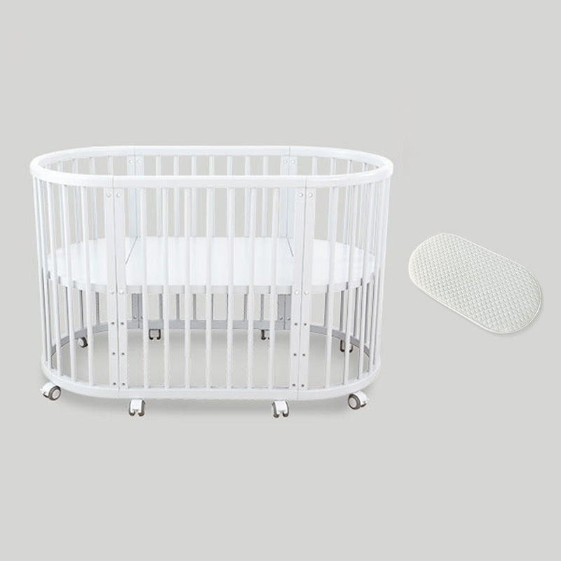 Oval Solid Wood Crib Nordic Style 5-In-1 Convertible Crib with Casters