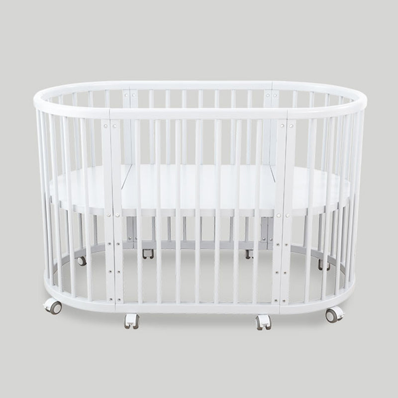 Oval Solid Wood Crib Nordic Style 5-In-1 Convertible Crib with Casters