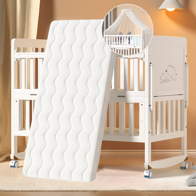 Scandinavian 2-in-1 Solid Wood Nursery Bed in White Wheels and Storage