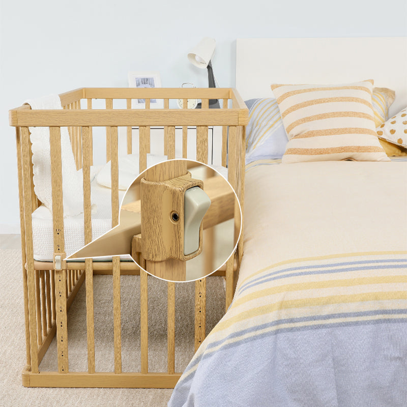 Contemporary 25.19" Wide Wooden Nursery Bed in Natural with Wheels