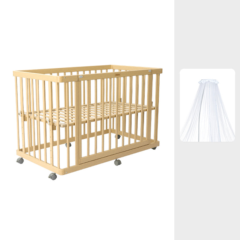 Contemporary 25.19" Wide Wooden Nursery Bed in Natural with Wheels