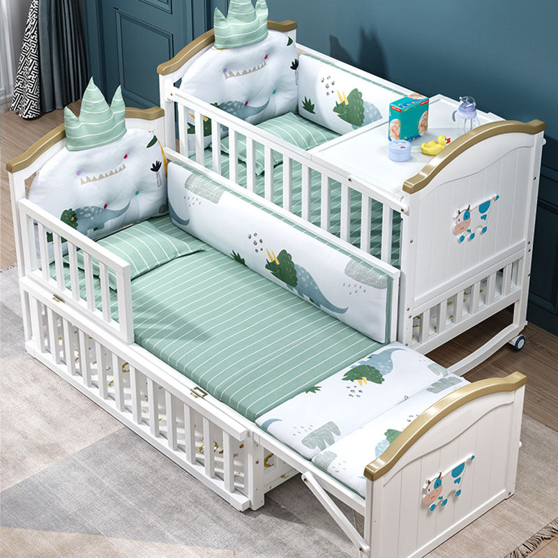 Contemporary White Baby Crib with Guardrail and Casters and Storage