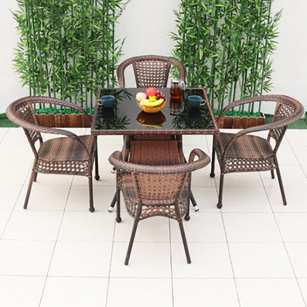 Tropical Brown Armed Chairs with Faux Rattan Open Back in Metel