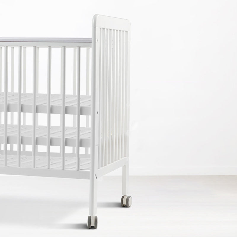 Crib with Guardrail in White Adjustable Height and Storage Crib