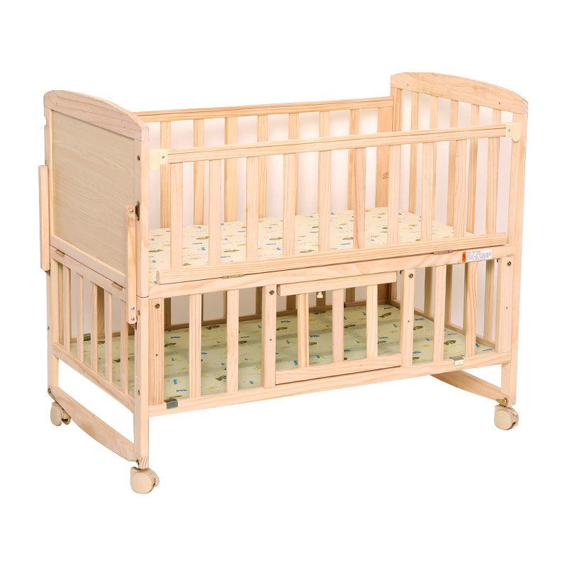 Convertible Nursery Crib with Casters and Changing Table in Light Wood