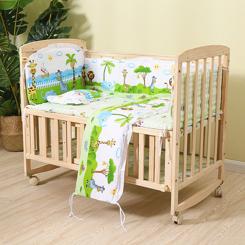 Convertible Nursery Crib with Casters and Changing Table in Light Wood