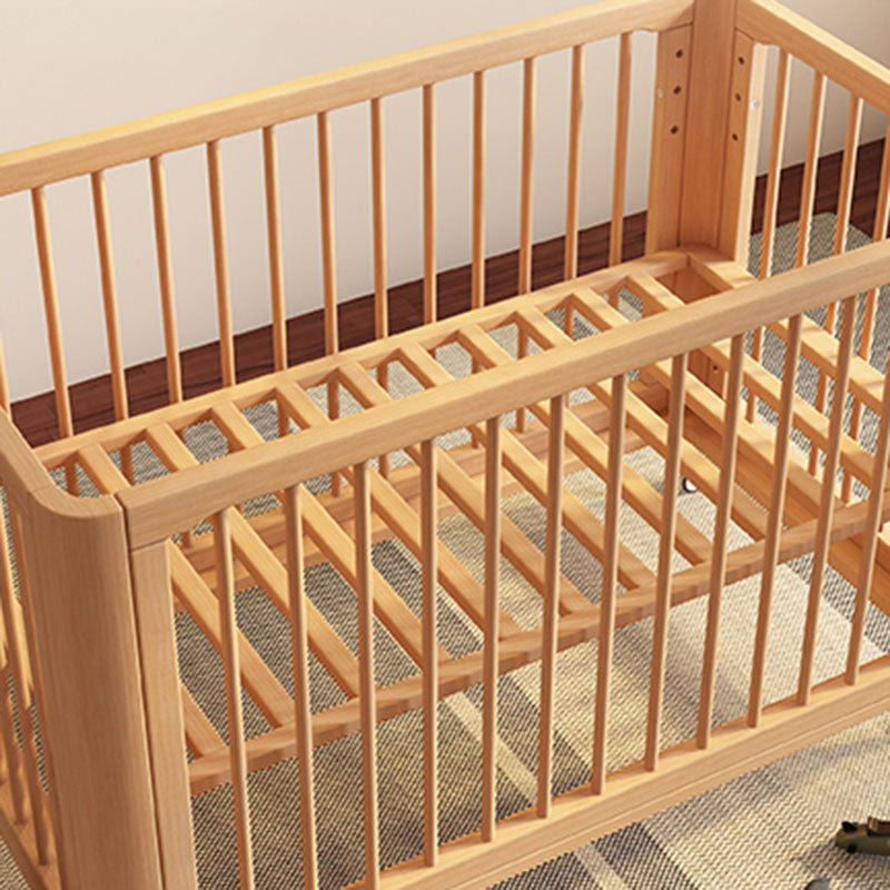 Contemporary Nursery Crib with Adjustable Height and Casters in Beech