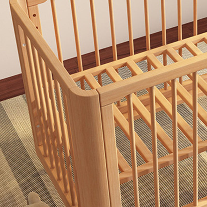 Contemporary Nursery Crib with Adjustable Height and Casters in Beech