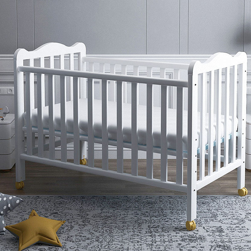 Farmhouse Wooden Baby Crib with Guardrail and Casters in Pine Wood