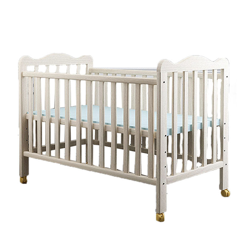 Farmhouse Wooden Baby Crib with Guardrail and Casters in Pine Wood