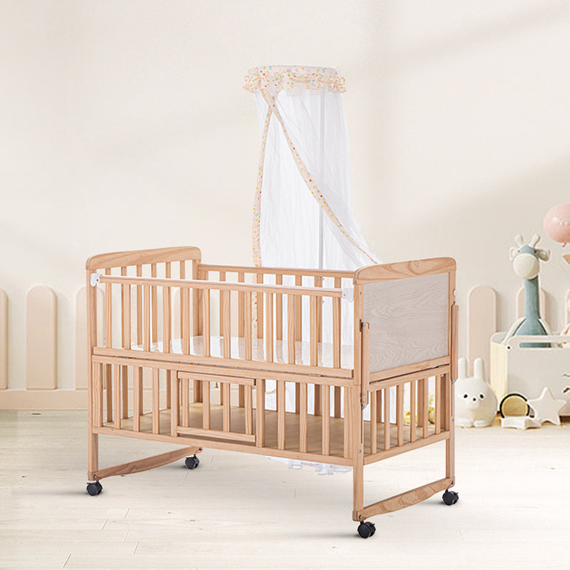 2-in-1 Solid Wood Crib with Guardrails Natural Mini Crib with Casters