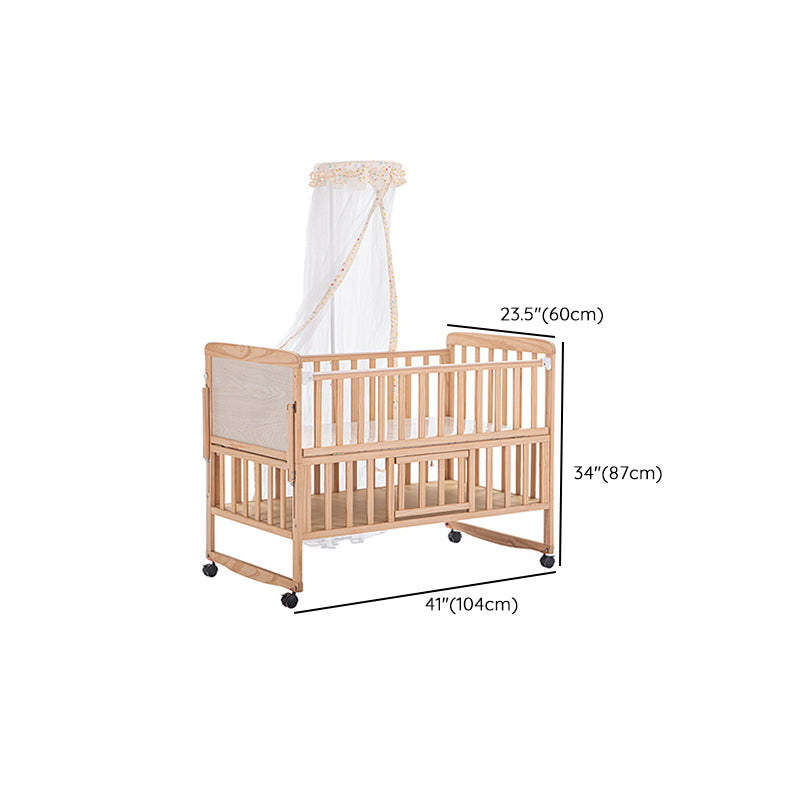 2-in-1 Solid Wood Crib with Guardrails Natural Mini Crib with Casters