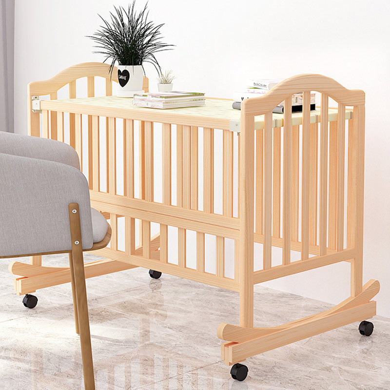 2-in-1 Wooden Crib with Casters Natural Mini Crib with Guardrail and Mattress