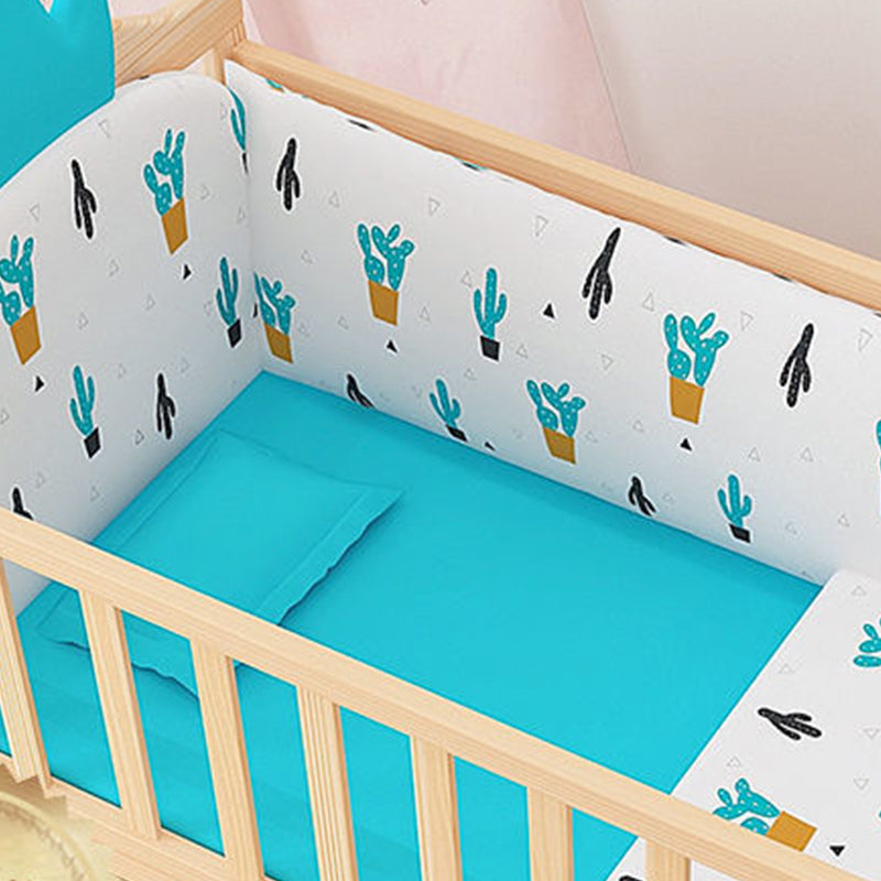 2-in-1 Wooden Crib with Casters Natural Mini Crib with Guardrail and Mattress