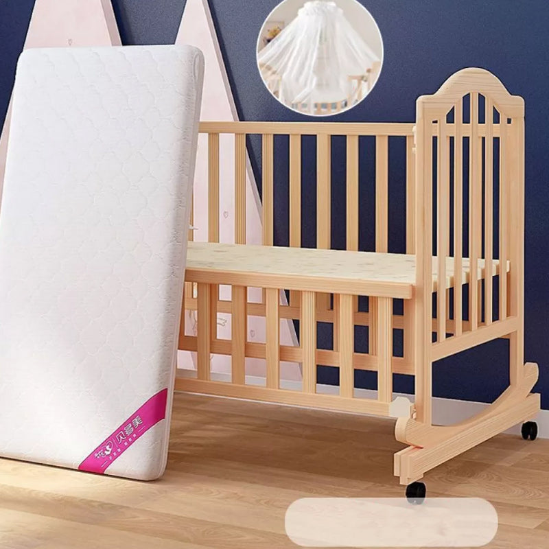 2-in-1 Wooden Crib with Casters Natural Mini Crib with Guardrail and Mattress