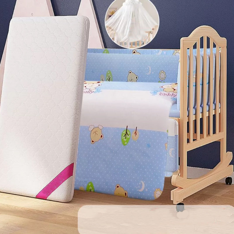 2-in-1 Wooden Crib with Casters Natural Mini Crib with Guardrail and Mattress