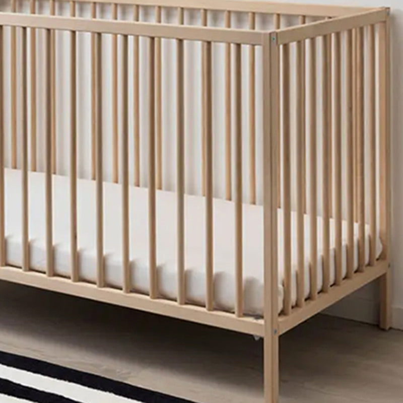 Traditional Nursery Crib with Adjustable Height in Natural Wood