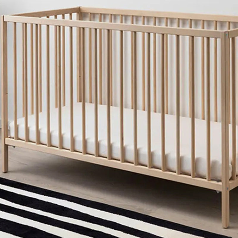 Traditional Nursery Crib with Adjustable Height in Natural Wood