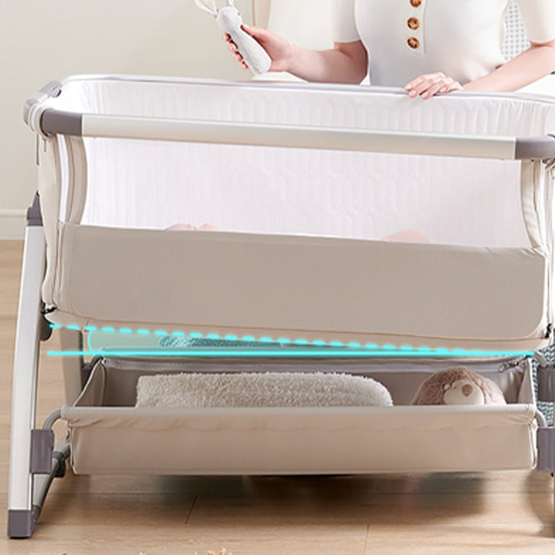 Gliding and Adjustable Metal Bassinet Oval Cradle with 4 Wheels and Storage Shelf
