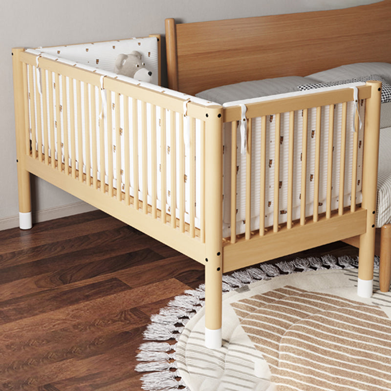 Modern Farmhouse Nursery Crib with Adjustable Height in Natural Wood