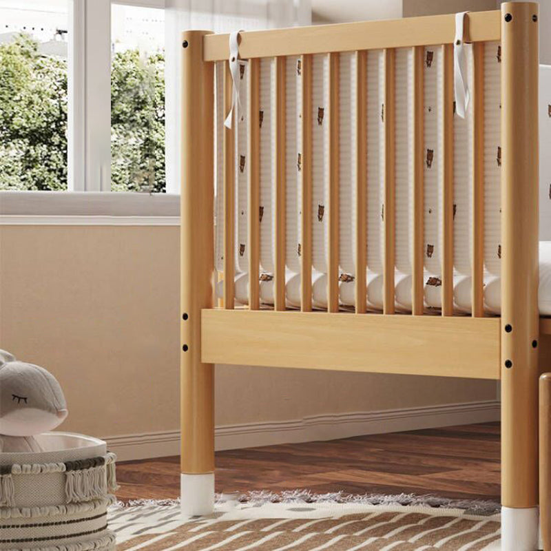 Modern Farmhouse Nursery Crib with Adjustable Height in Natural Wood