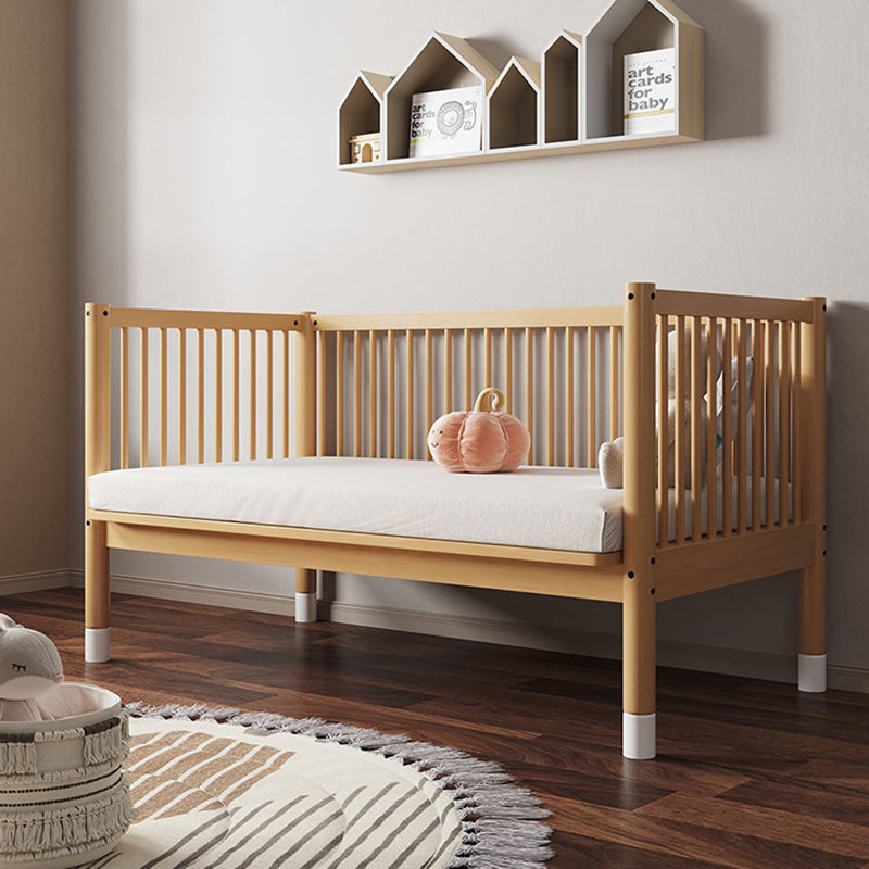 Modern Farmhouse Nursery Crib with Adjustable Height in Natural Wood