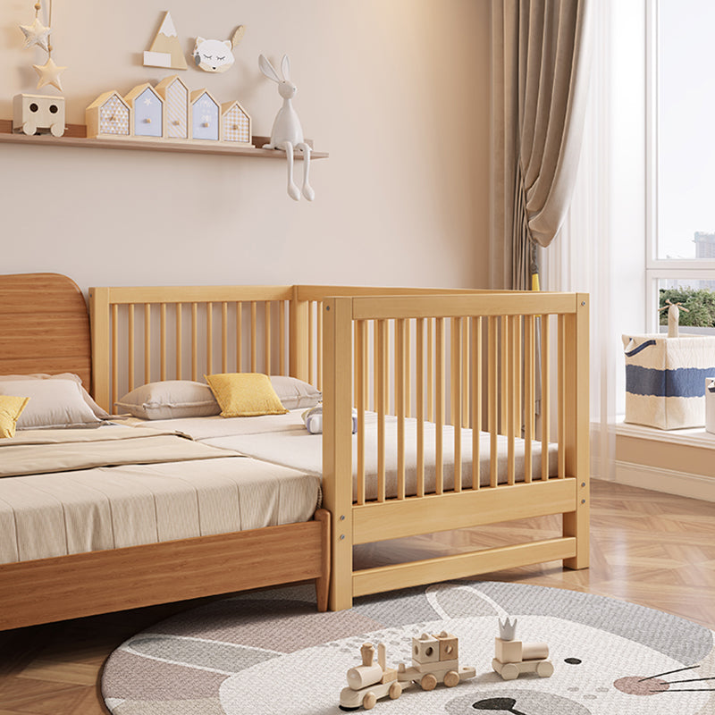 Functional Nursery Crib with Adjustable Height in Natural Wood