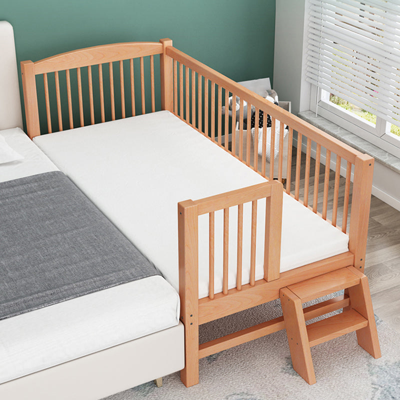 Functional Nursery Crib with Adjustable Height in Natural Wood