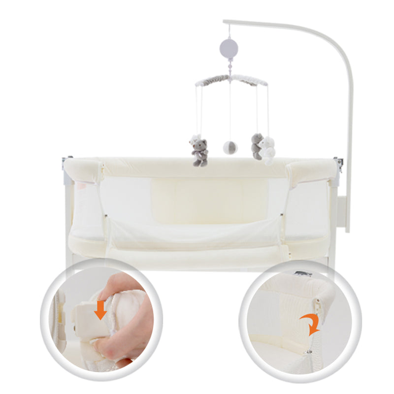 Modern Rocking Crib Cradle Metal Oval Bedside Bassinet with 4 Wheels