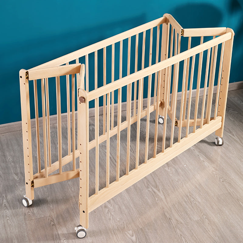 2-in-1 Folding Wooden Crib Natural Baby Crib with Mattress and Casters