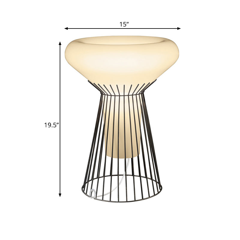 Schwarzer Sanduhr-Käfig-Nachttisch-Beleuchtung zeitgenössischer 1-Licht-Eisenschreibtischlampe für Bett