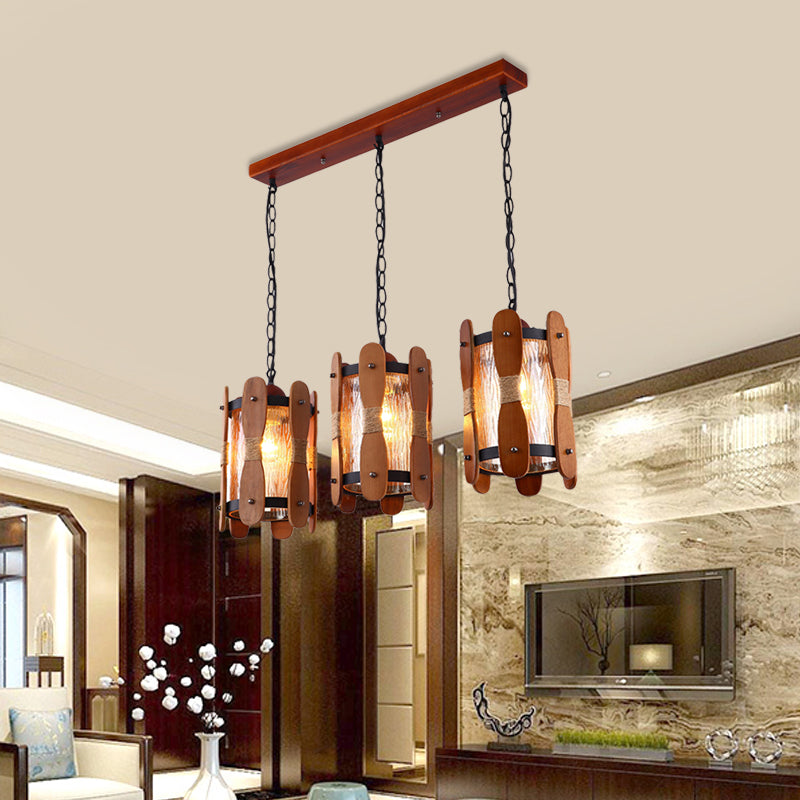 Cylinder Yellow Water Glass Cluster Pendant Retro 3 Heads Dining Room Hanging Light Kit in Brown with Wood Panel Design