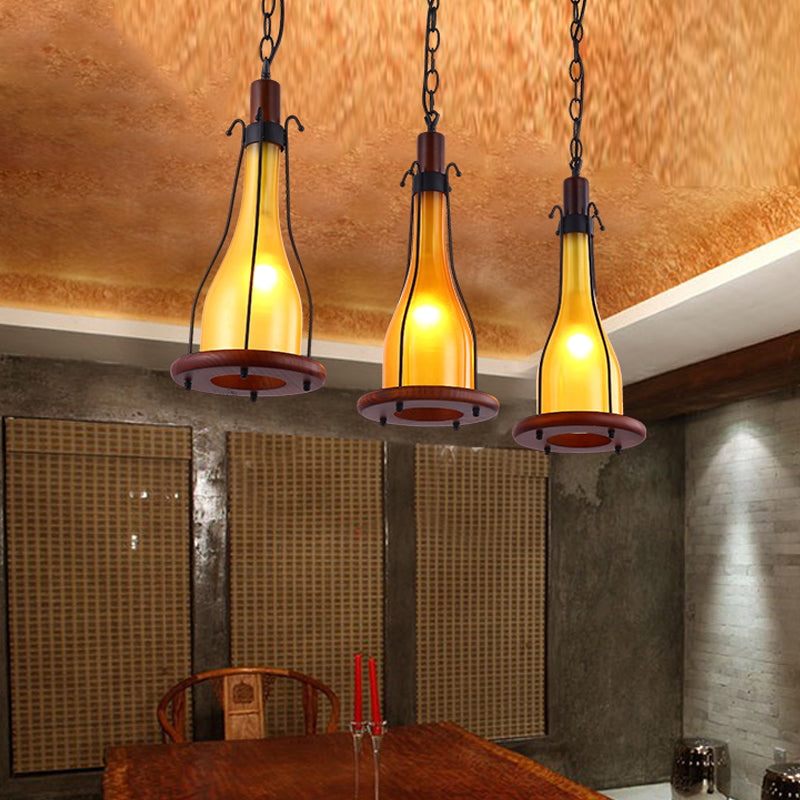 Brown Bottle Cluster Pendant Light Warehouse Yellow/White Glass 3 Heads Dining Room Ceiling Fixture with Wood Linear Canopy