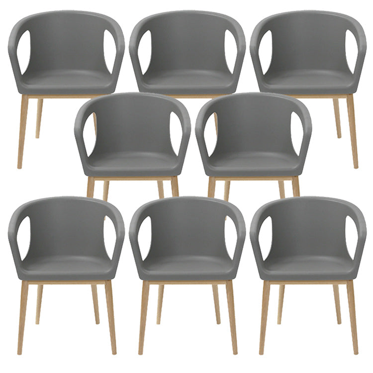 Contemporary Dining Armchair in Plastic with Solid Wood Legs