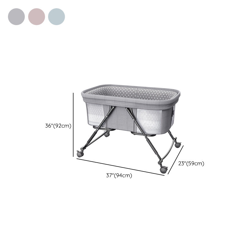 Modern Plastic Color Matching Oval Nursery Crib with Casters