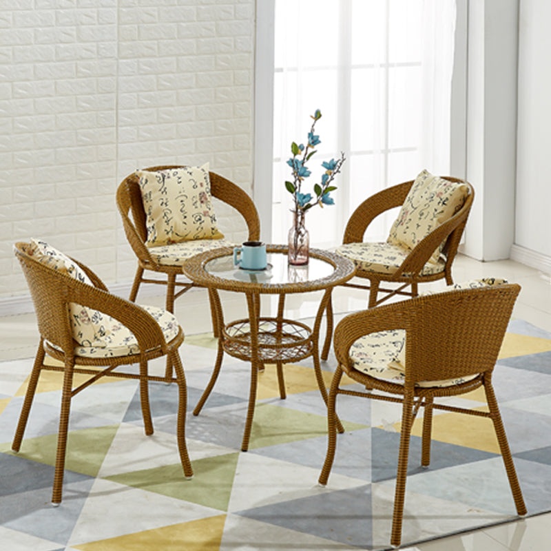 Glass Dining Table Set with Armless Rattan Chairs for Courtyard