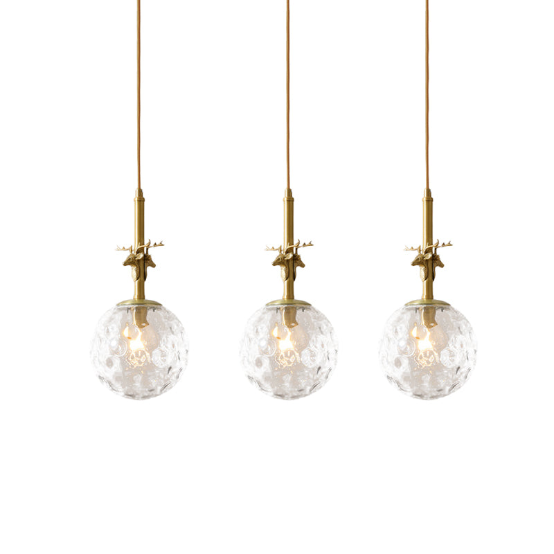 3 Lights Ball Multi Light Pendant Traditional Brass Finish Clear Dimpled Glass Ceiling Lamp with Antler Deco