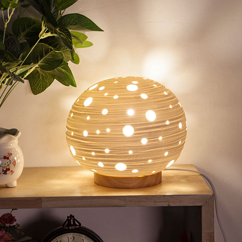 1 Head Bedroom Night Table Light Contemporary White Desk Lamp with Laser-Cut Ball Ceramics Shade