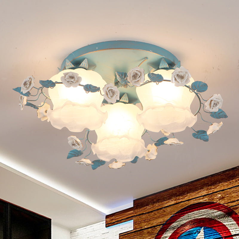 Pastoral Half-Open Flower Ceiling Lamp 3/5 Lights Frosted Glass Semi Mount Lighting with Rose Wreath in Pink/Blue