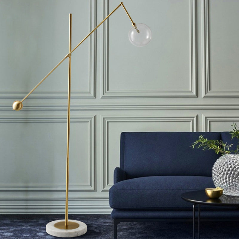 Modernist Orb-Like Task Floor Lamp Metal Single Bulb Office Standing Light with Balance Arm in Gold