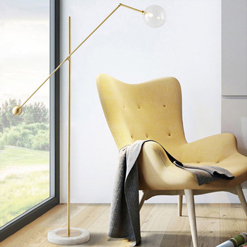 Modernist Orb-Like Task Floor Lamp Metal Single Bulb Office Standing Light with Balance Arm in Gold